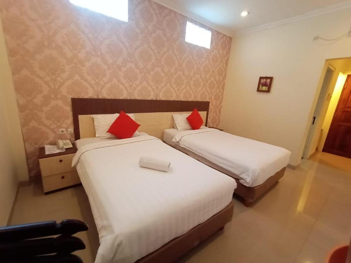 Oyo 90473 Gowin Hotel Kuta  Exterior photo