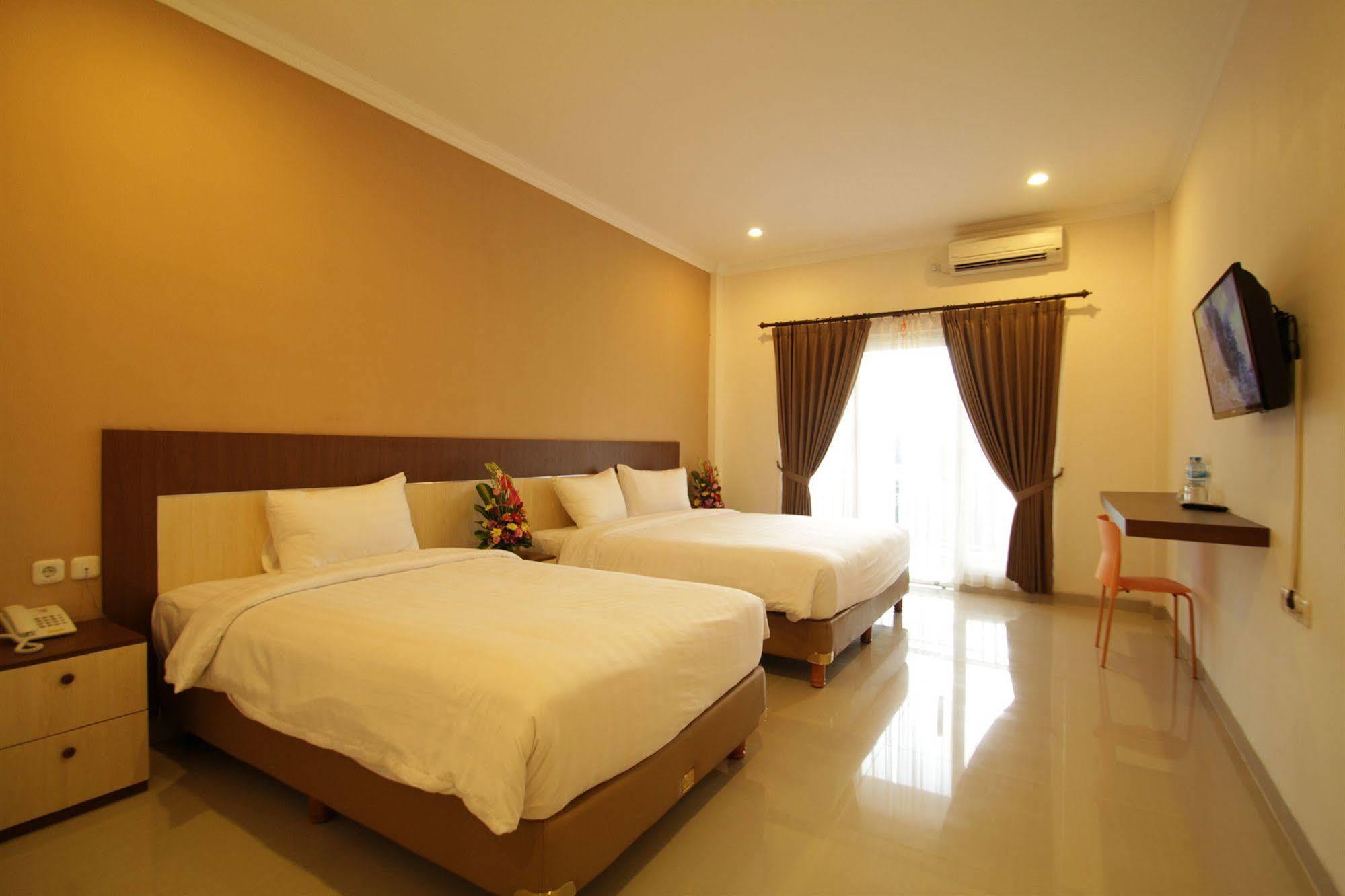 Oyo 90473 Gowin Hotel Kuta  Exterior photo